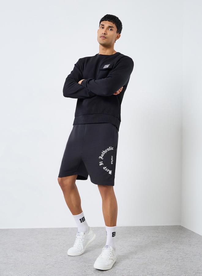 ستايلي شورت رجالي أسود بطبعة جرافيك - Image 1